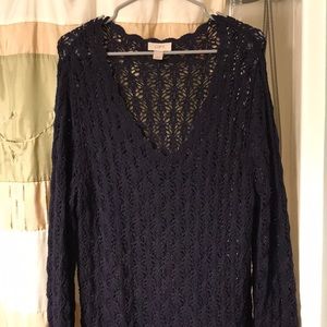 Dark blue knit sweater.